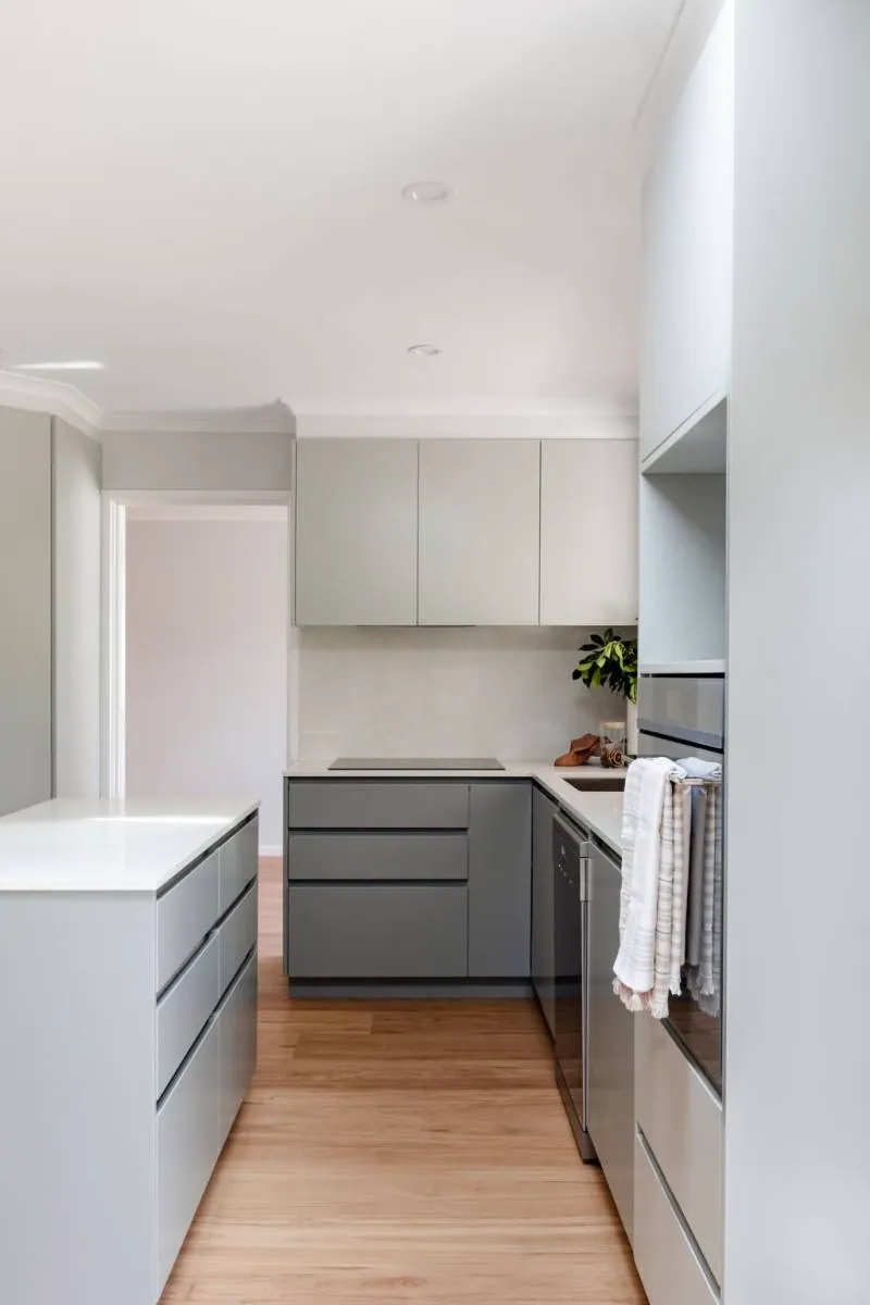 White island bench and grey cabinetry in the Belconnen kitchen