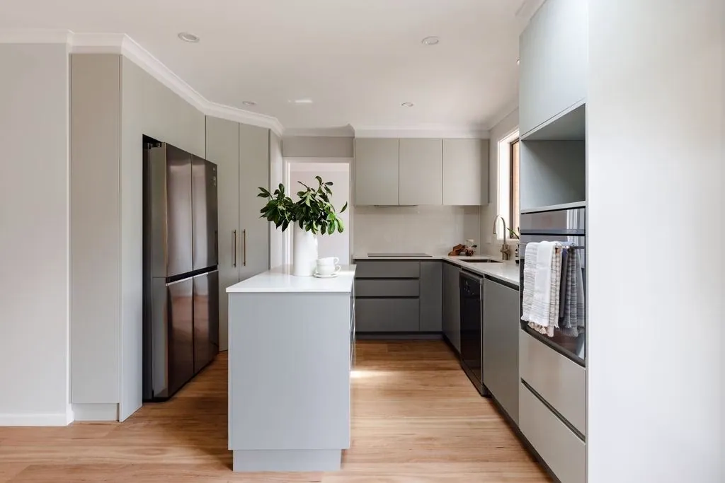 Belconnen kitchen island with grey cabinetry behind