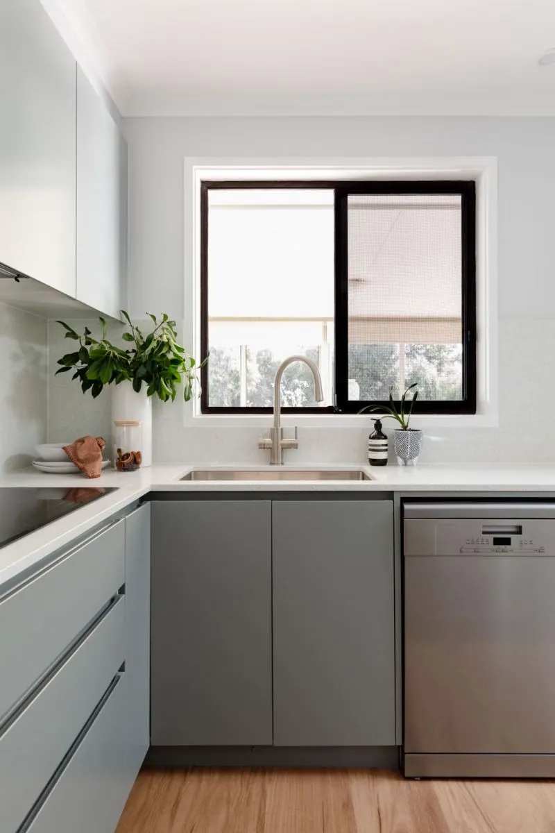 Window above the sink in the grey Belconnen kitchen