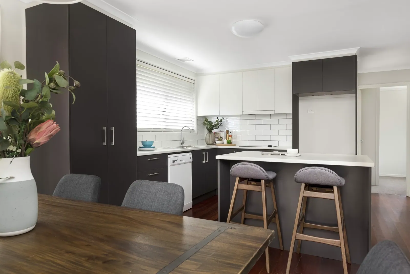 Giralang kitchen and dining area with the island in the foreground