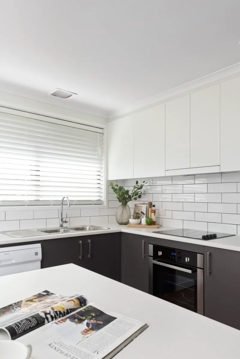 Giralang bench run with subway tiles and dark grey drawers