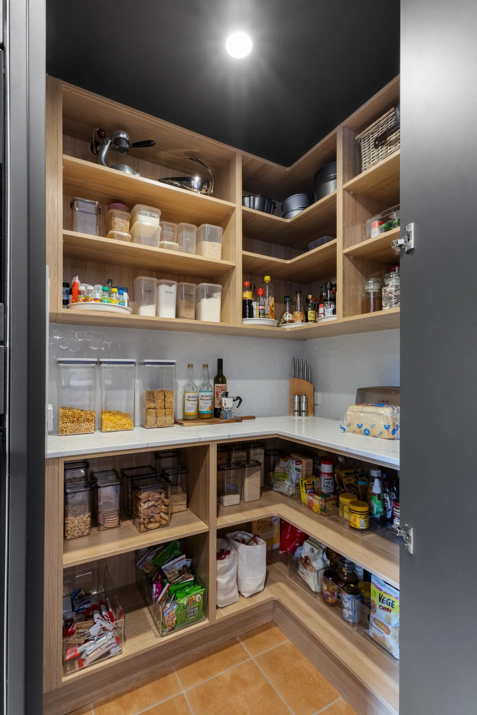 Walk-in pantry shelving in the Nicholls kitchen