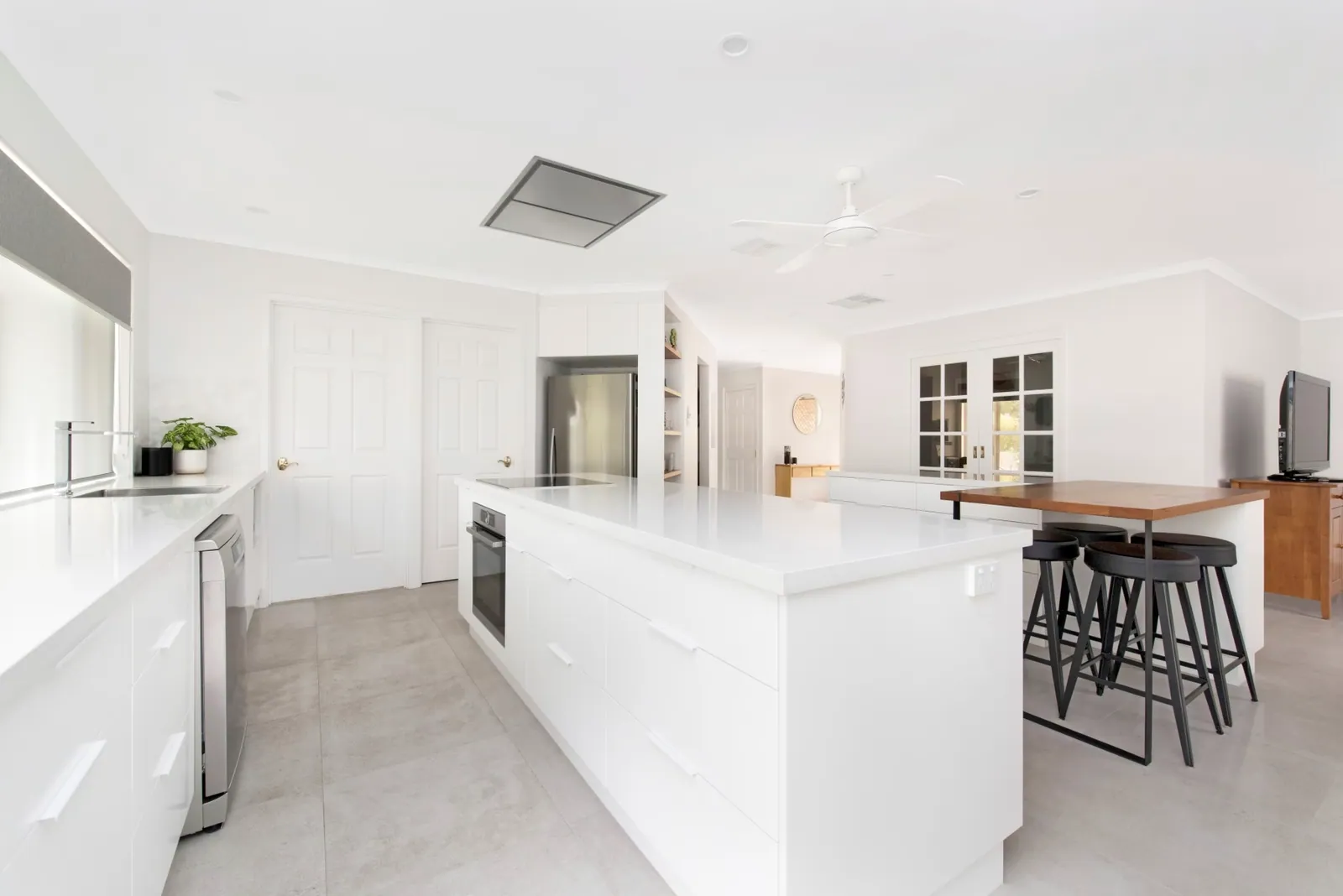 Induction cooktop and white benchtop in the Palmerston kitchen