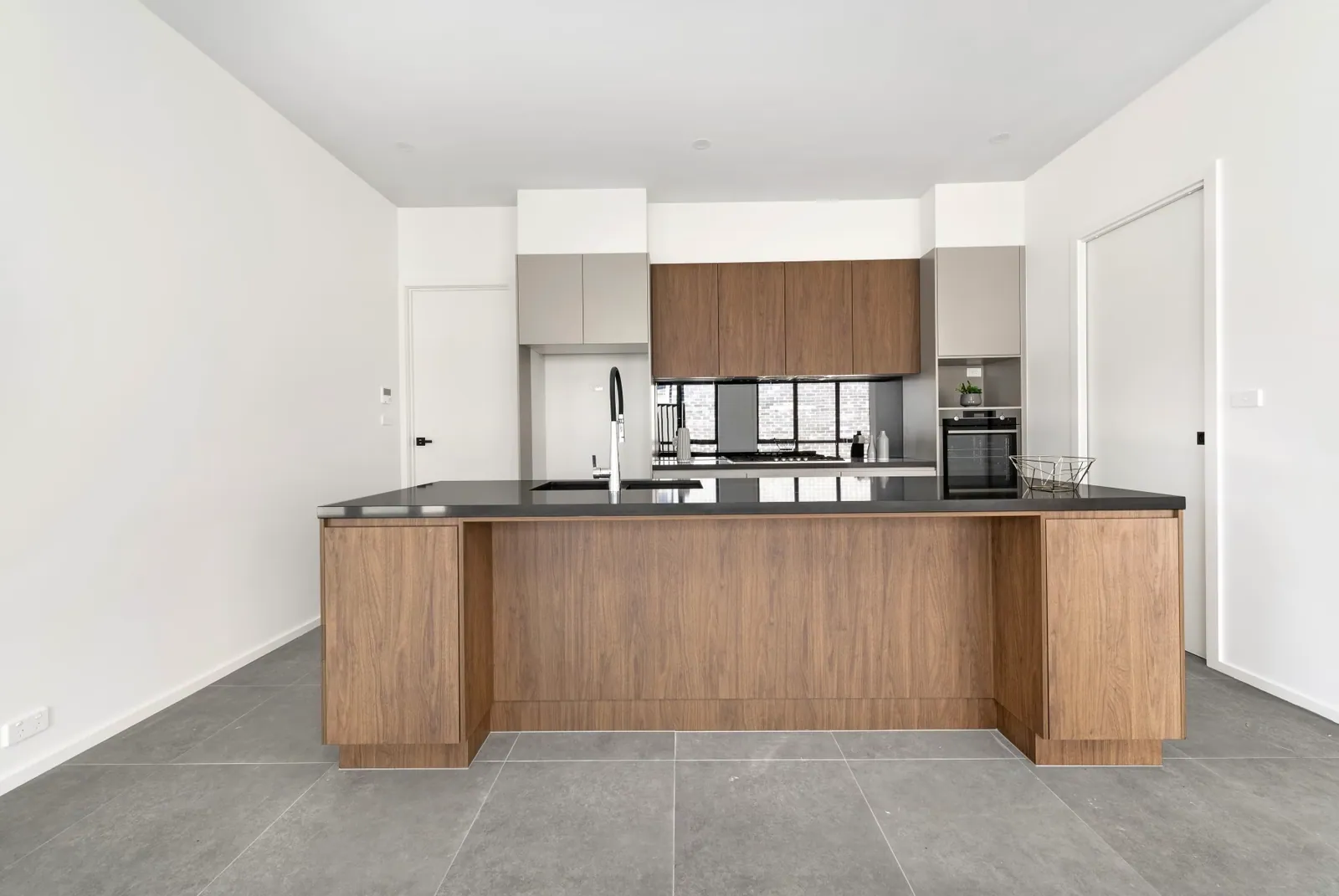 Timbergrain island and bench runs in the Taylor kitchen