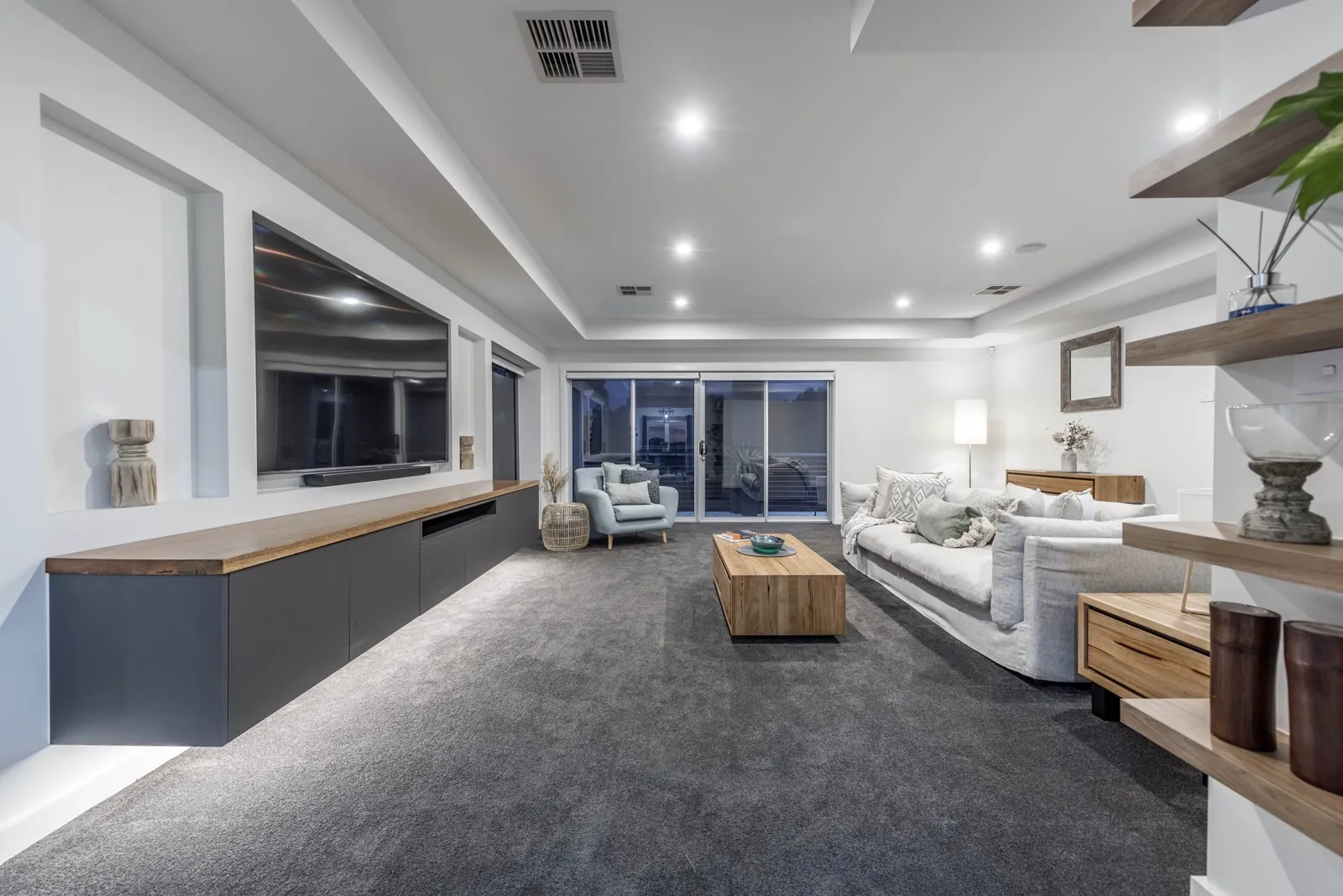 Living space beside the Weetangera kitchen with matching joinery